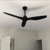 claro whisper ceiling fan in black bedroom